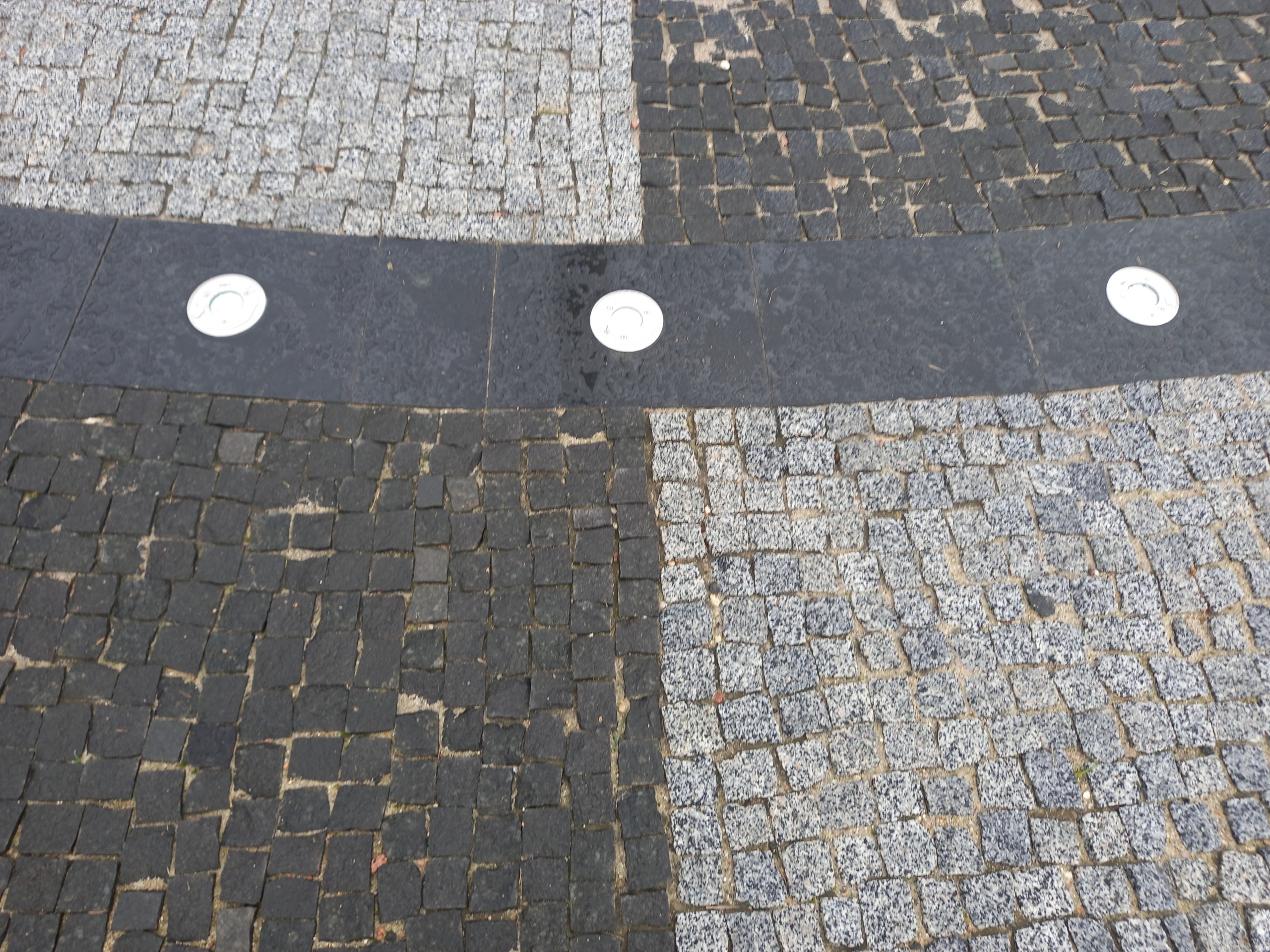 Grey and black stone paving stones