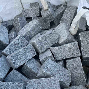 Split paving stone from grey granite