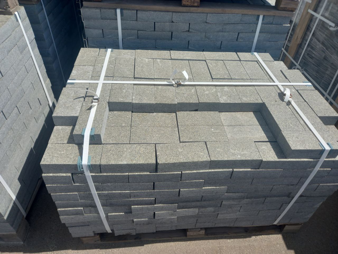 Black stone paving stone stacked on a pallet