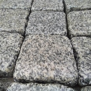 Paving stone from grey granite 10x10x3