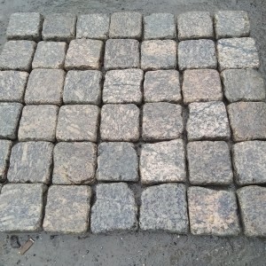 Tumbled paving stone from yellow granite 10x10x3