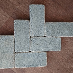 Tumpled paving stone from grey granite