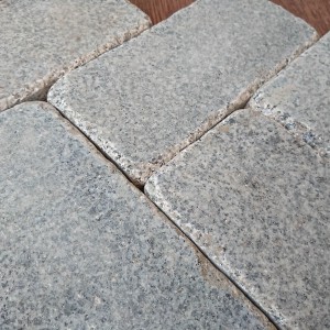 Tumpled paving stone from grey granite