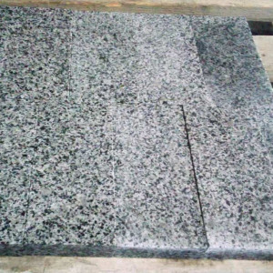 Paving stone from grey granite - flaming top
