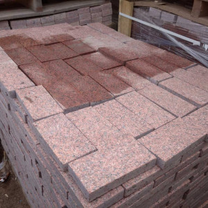 Paving stone from red granite - flaming top