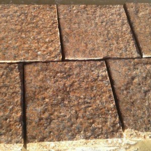 Red granite paving stone