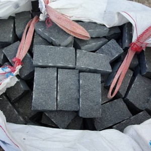 Sawn-split paving stones made of black Gabbro stone