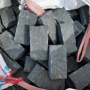 Sawn-split paving stones made of black Gabbro stone