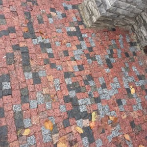 Sawn-split paving stone from red granite