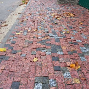 Sawn-split paving stone from red granite