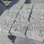Sawn-split paving stones from Pokostovsky granite - "rowing"