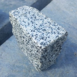 Sawn-split paving stones from gray granite