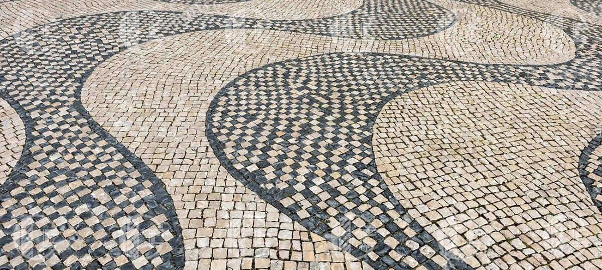 Paving stones made of black stone and sandstone