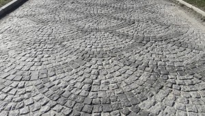 Split paving stones made of black natural stone