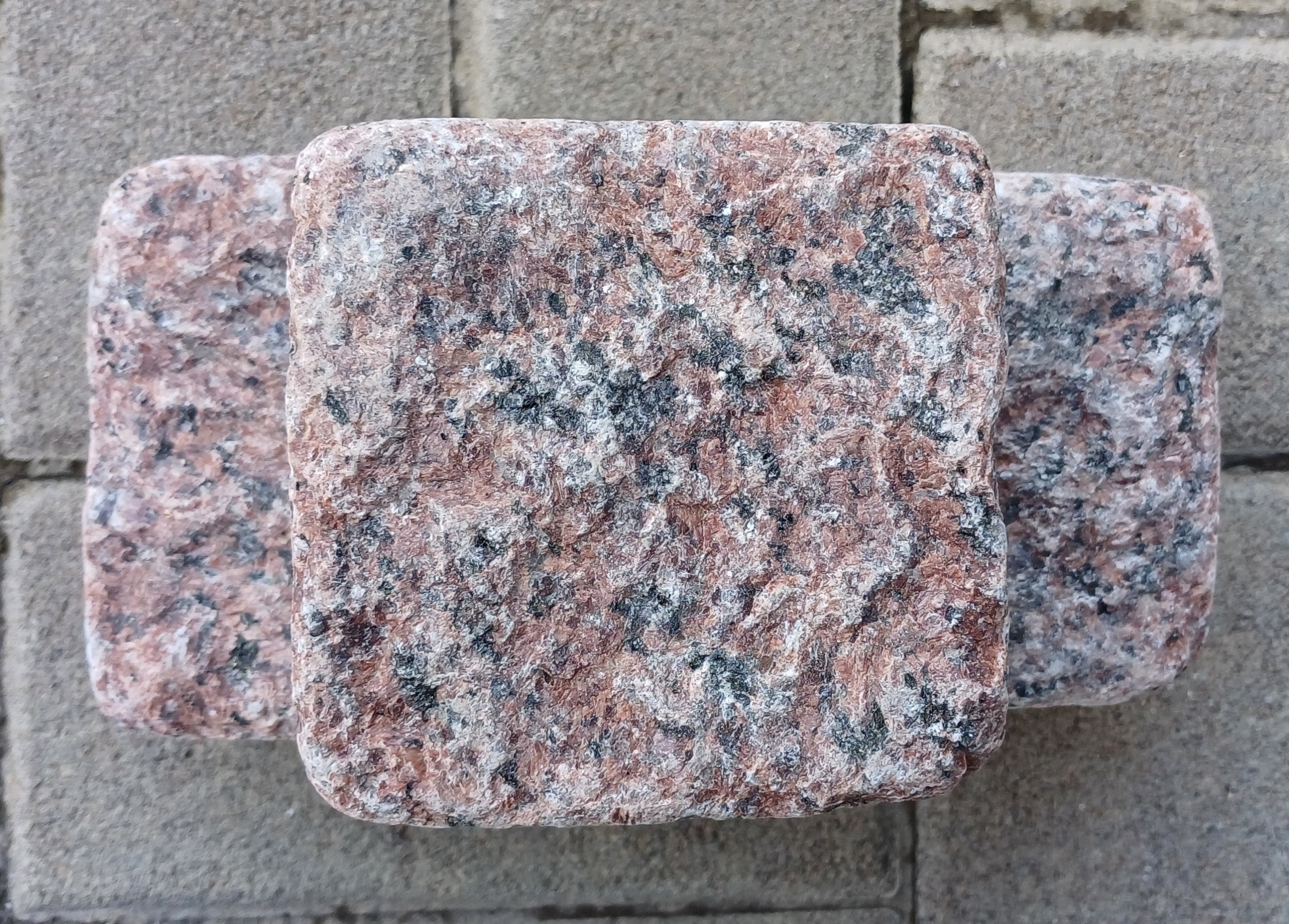 tumbled paving stones of red granite