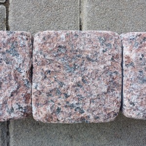 tumbled paving stones of red granite