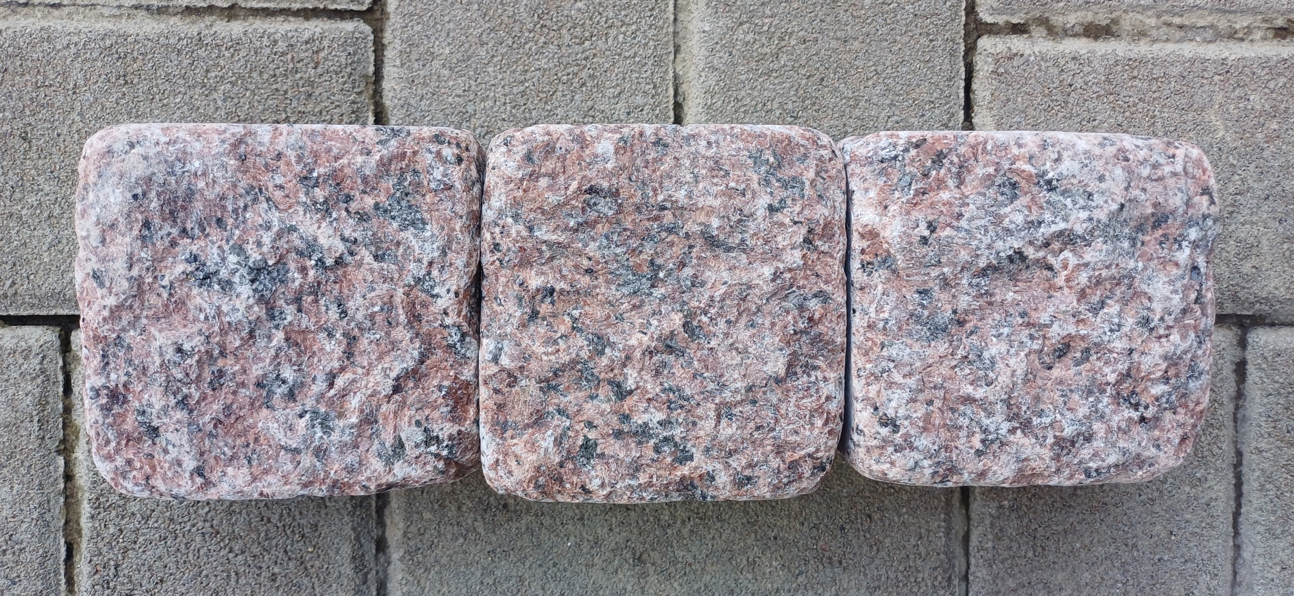 tumbled paving stones of red granite