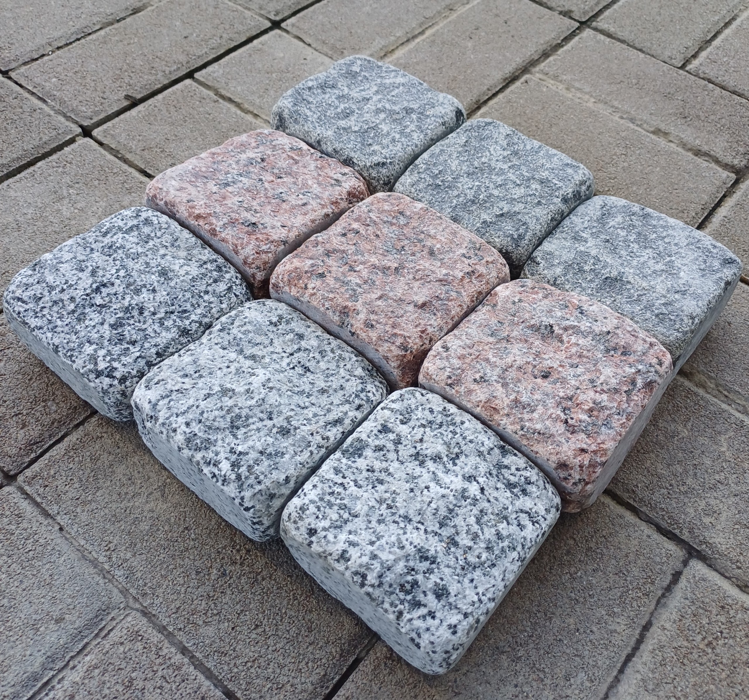 tumbled paving stones of red granite