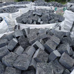 Sawn-split labradorite paving stones in a big bag