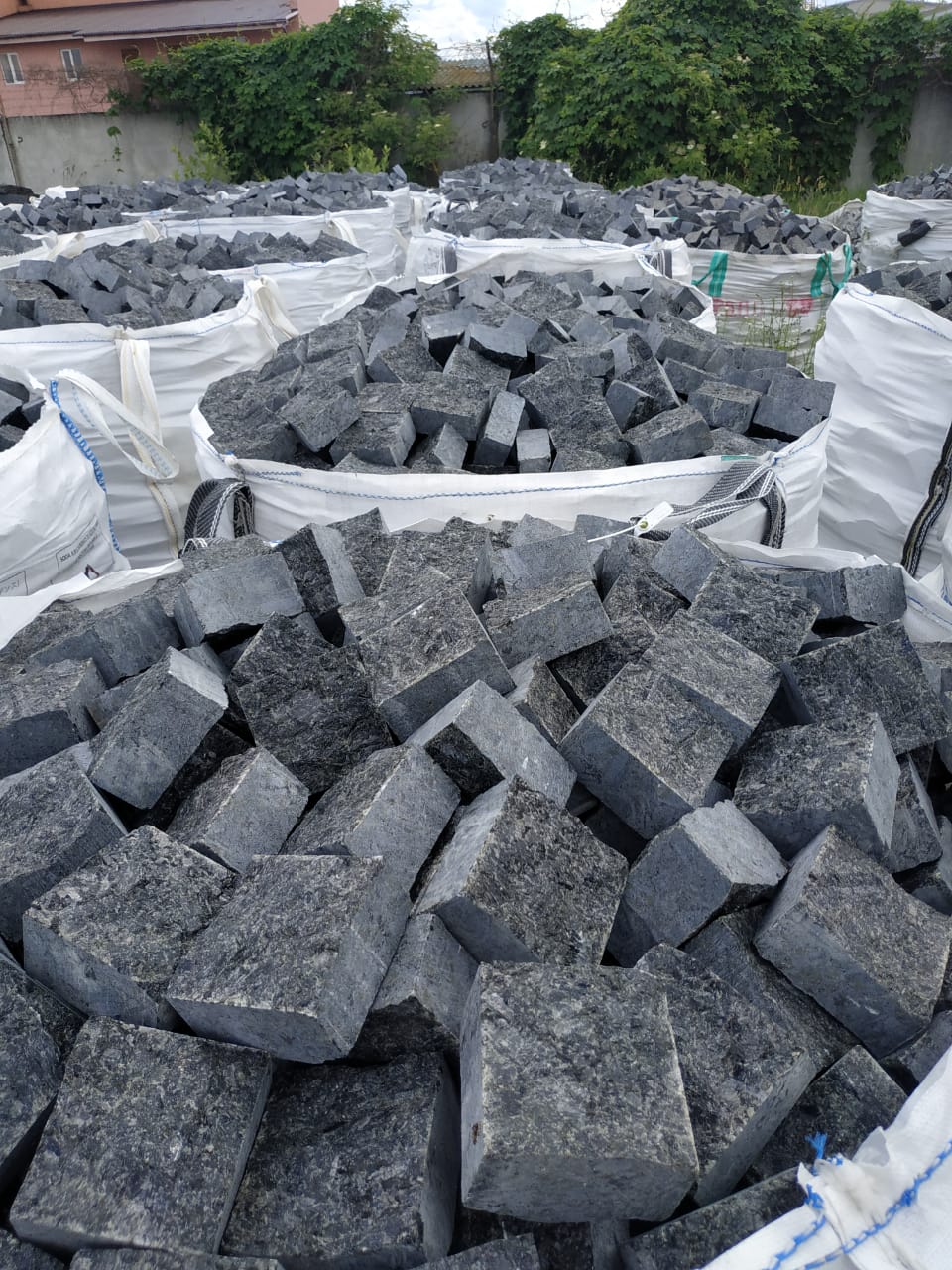 Sawn-split labradorite paving stones in a big bag