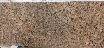 Colour and texture of yellow granite Skifiya Gold