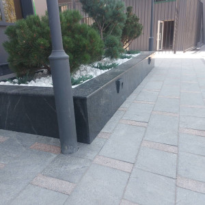 Tiles from flamed granite Pantera Grey