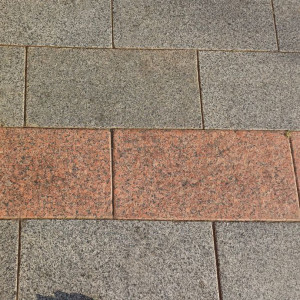 Flamed grey and red granite tile