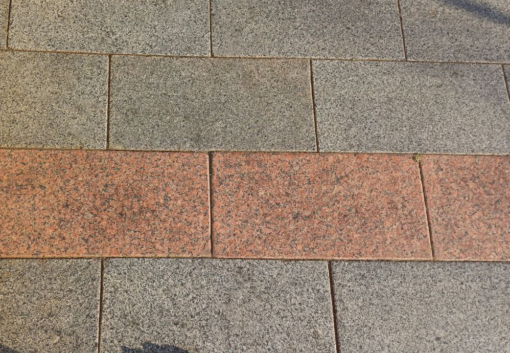 Flamed grey and red granite tile