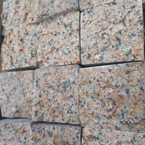 Paving stone from pink granite Flower of Ukraine