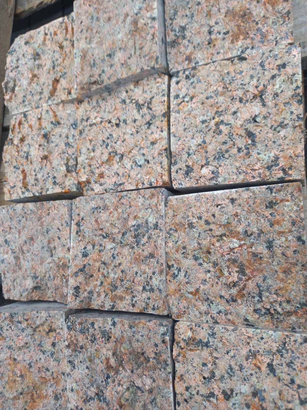 Paving stone from pink granite Flower of Ukraine