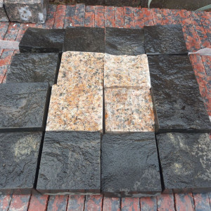 Paving stone from granite Flower of Ukraine and stone Basalt