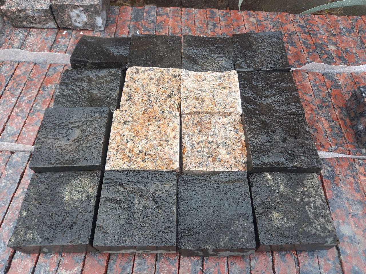 Paving stone from granite Flower of Ukraine and stone Basalt