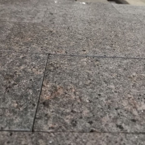 Colour and texture of paving stone from granite Star of Ukraine