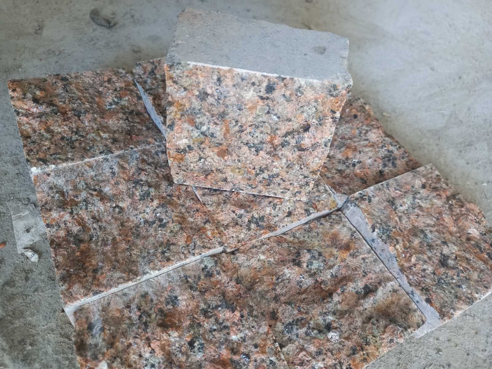 Sawn-split paving stone from granite Flower of Ukraine