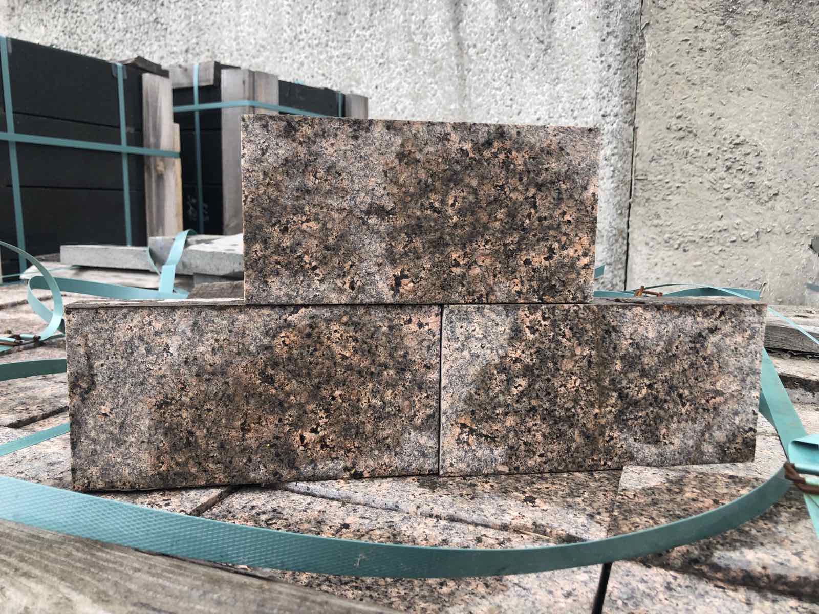 Paving stone from brown granite Star of Ukraine