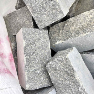 Paving stone ‘row’ from black stone Gabbro