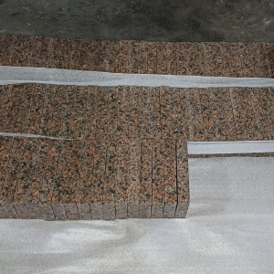 Sawed granite paving stone stacked on a pallet