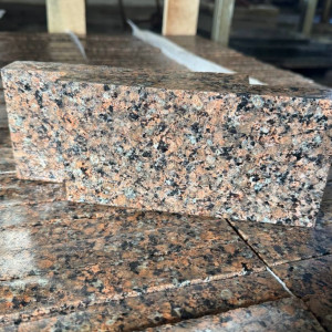 Sawed paving stone from pink granite Flower of Ukraine 20x10x3