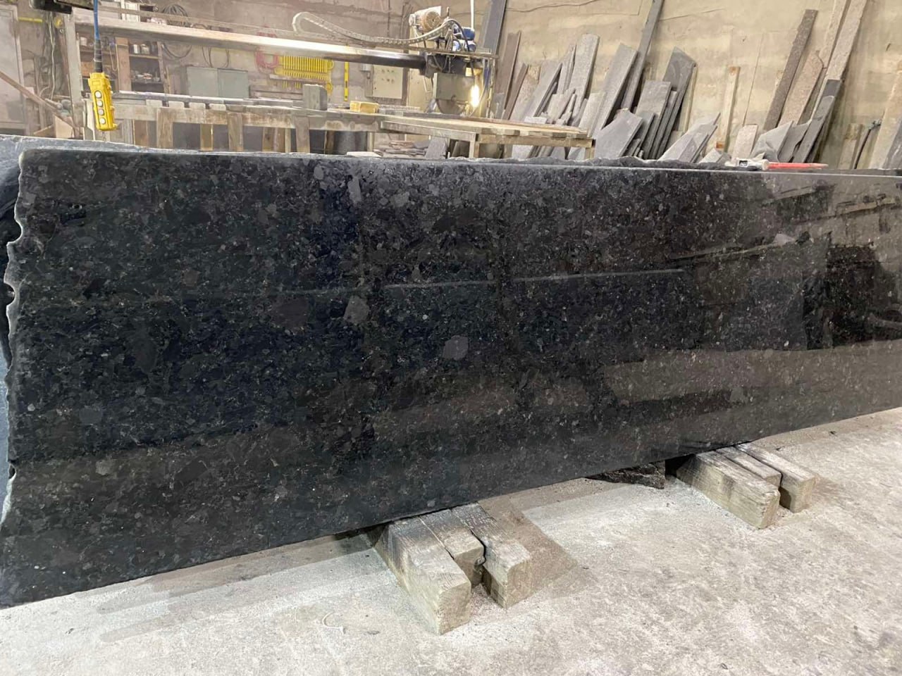 Slab of black natural Katerinovsky labradorite stone