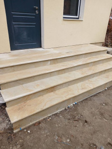 Staircase made of beige stone - sandstone