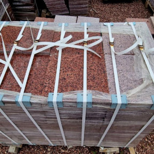 Packaged tiles made of Maple Red granite