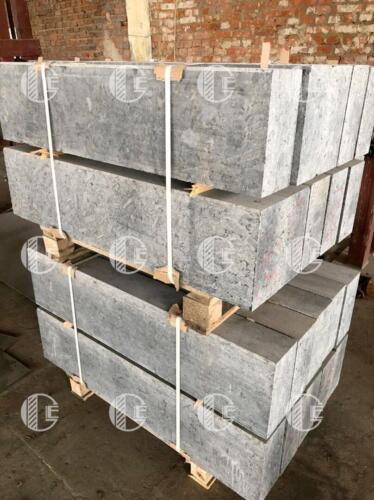 Granite curb with shades of green